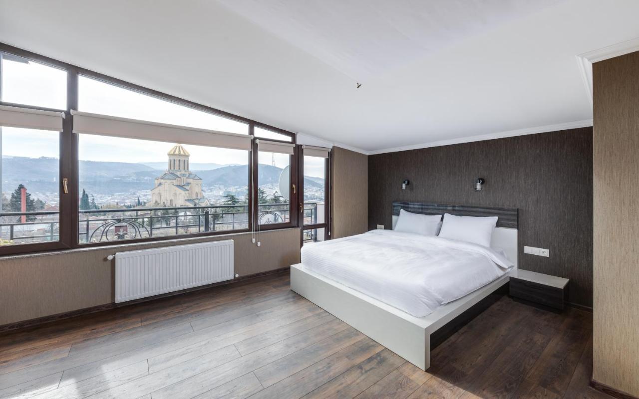 Siberia Hotel ティビリシ エクステリア 写真 A bedroom at the hotel